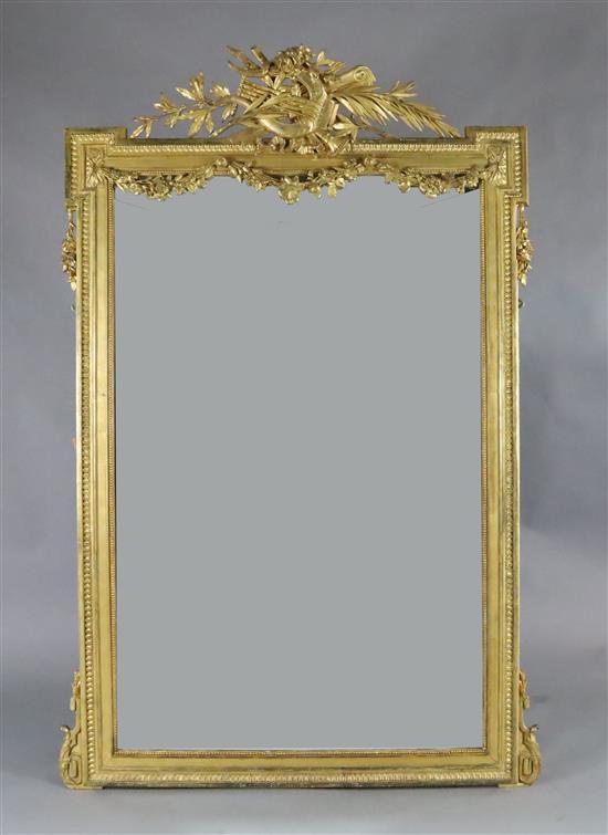 A late 19th French giltwood and gesso wall mirror, W.4ft 8in. H.6ft 3in